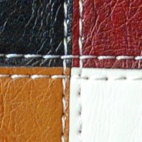 color swatch from the Black/Wine/Tan/White Vani purse