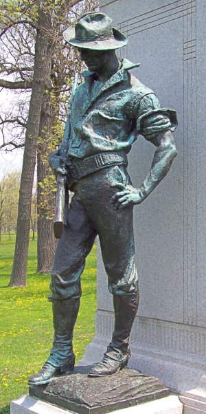 Statue of Spanish-American War soldier with cartridge belt.