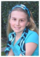 young girl in blue headband scarf