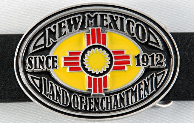 oval belt buckle of the New Mexico state flag