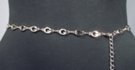 silver chain belt made of 29 inches of 7/16" wide oval G's and 14 inches of chain with singleton G at tip