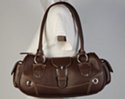 dark brown baguette handbag with zipper top and double shoulder straps