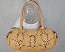 tan baguette handbag with zipper top and double shoulder straps