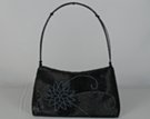 arch handle small beaded evening bag with floral design
