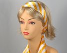 golden yellow and white headscarf attached to plastic headband
