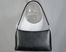 cord strap shoulder purse with flowing contour