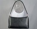 cord strap shoulder purse with flowing contour