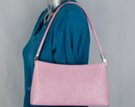 pink cord strap shoulder purse with flowing contour