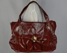 glossy two-tier tote with ornamental cord