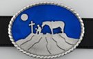 moonlit cowboy kneeling at cross oval belt buckle