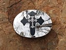 biker cross mirror buckle on stone