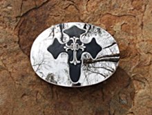 biker cross mirror buckles on stone