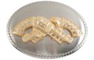 crossed pistols with rhinestones on oval buckle