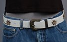 1-1/2" distressed leather strap belt, "daisy chain" brass studs, bronze color western-style squash blossom buckle and keeper