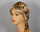 orange-based multi-colored lattice pattern headscarf attached to plastic headband