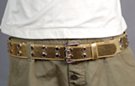 leather belt with double rows of metal eyelets, double prong roller buckle and plain leather retainer