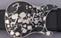black Fender electric guitar belt buckle