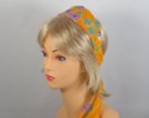 fuchsia and violet flowers on orange chiffon belt scarf attached to plastic headband