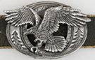 3-D attacking eagle belt buckle with forest and Indian motif
