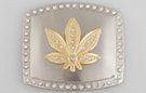 gold marijuana leaf with rhinestones on chrome belt buckle