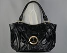 glossy golden gate tote with golden circle pin latch