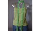 green beads sewn into long skinny spring green crochet summer scarf