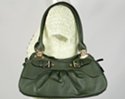 teardrop hinged strap handbag with brass buckles