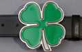 belt buckle, bright green four leaf clover trimmed in chrome