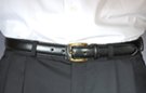 1-1/8" black single stitch leather dress belt, oil tan finish, oblong 1-3/4" gold-tone buckle with leather protector and keeper