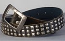 black distressed leather belt with triple rows of hobnail and pyramid studs, pewter center bar buckle