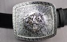 3-D lion's head, face and mane, Aztec border; silver-tone