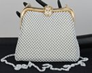 white clip-top metal mesh evening bag