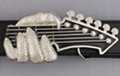 monster hand on guitar neck belt buckle