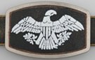 stenciled eagle on distressed leather and pewter belt buckle