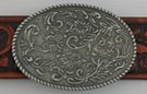 oval pewter western belt buckle, floral relief design