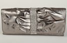 pleated soft leatherette pewter evening bag with vertical rhinestone band