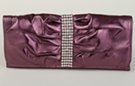 pleated soft leatherette purple evening bag with vertical rhinestone band