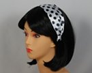 white satin hairband with black polka dots