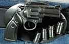 gunmetal revolver buckle with spinning cylinder and ammo