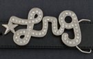 rhinestone "lrg" and star belt buckle