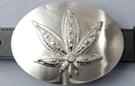 belt buckle, rhinestone studded pot leaf on nickel brush oval