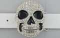 rhinestone studded ruby toothed skull belt buckle
