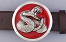 disc belt buckle, chrome rattlesnake on red enamel background
