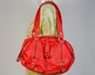 bright red padlock fob slouchy handbag with ruched ends and cargo shoulder straps