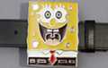 Square sponge man belt buckle, crazy happy yellow, white, black and red on chrome, 4 oz.