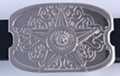 Little Texas star inside big Texas star belt buckle, silver-tone with swirled cloud background