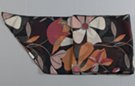 chiffon belt scarf, garden of big-petal flowers in rust, violet, pink, orange, grey and white against a black background