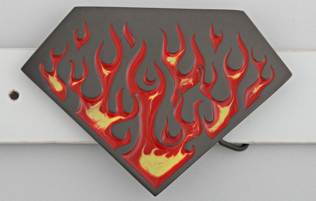 diamond shape belt buckle with red and yellow flames on black